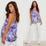 Õlapaeltega satäänist lilla-valge lilleline rasedate pluus